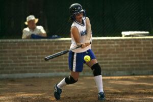 batter swings at ball