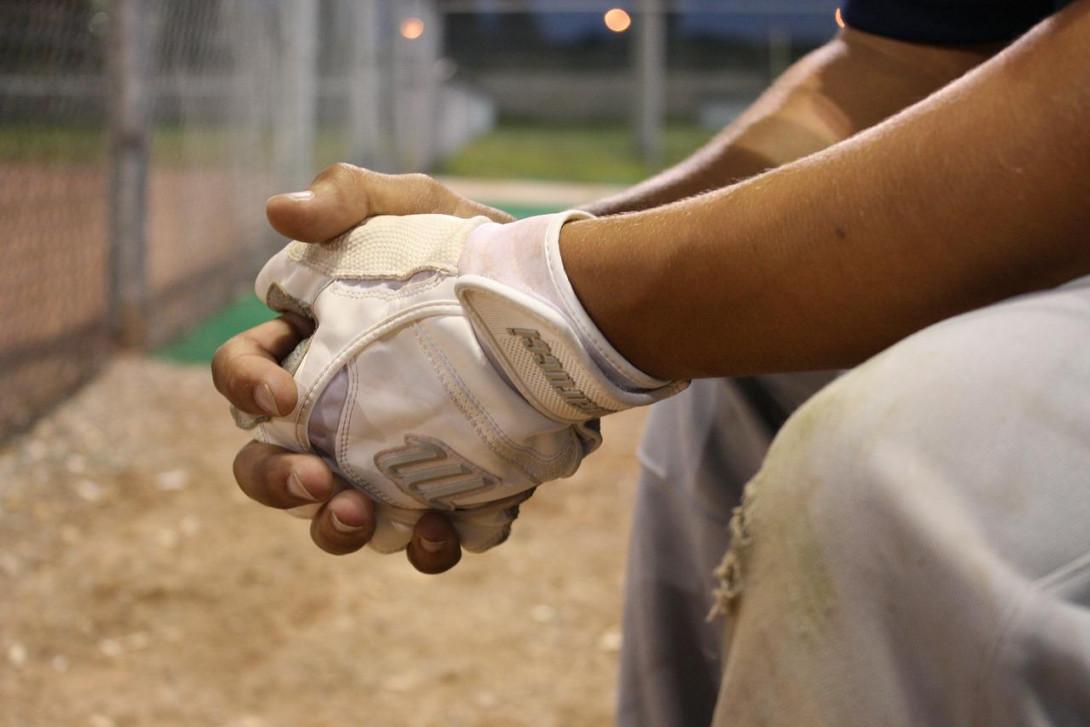 injured-player-sitting-in-dugout